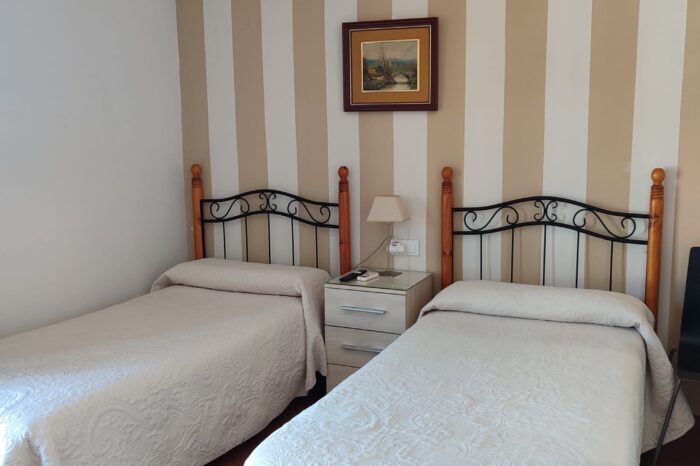 Hostal El Taxi - Habitación Dos Camas Individuales