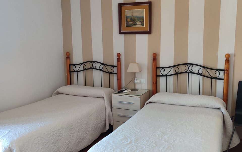 Hostal El Taxi - Habitación Dos Camas Individuales